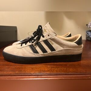 NWT Adidas Puig men’s shoe. Size 10.5, never worn. Comes with box.